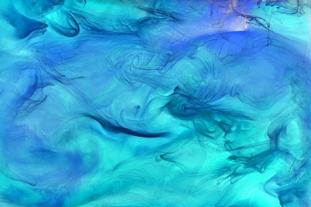 Liquid fluid art abstract background Blue acrylic paint underwater galactic smoke ocean