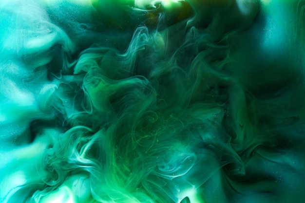 Liquid fluid art abstract background Blue green acrylic paint underwater galactic smoke ocean