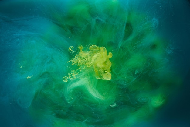 Liquid fluid art abstract background Blue green acrylic paint underwater galactic smoke ocean