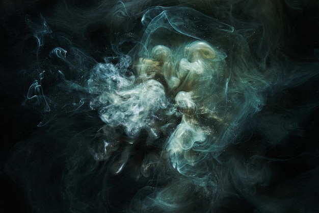 液体流体アート抽象的な背景暗い色とりどりの煙が踊るアクリル絵の具水中空間海の宇宙爆発