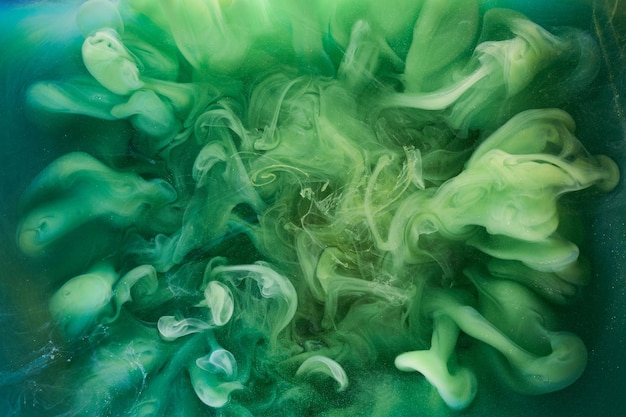 Liquid fluid art abstract background Green dancing acrylic paints underwater cosmic smoke ocean