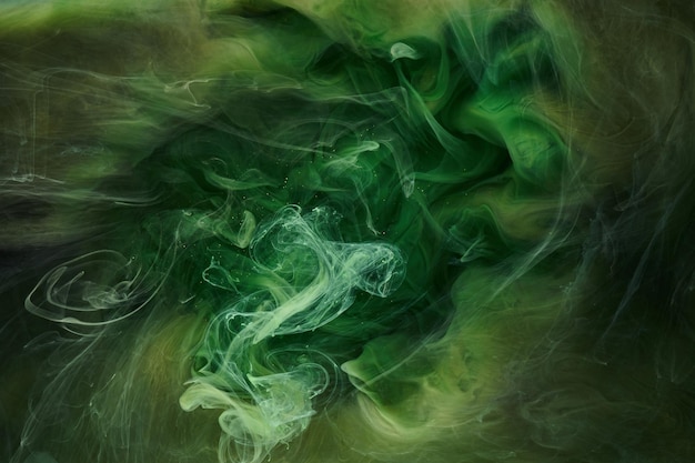 Liquid fluid art abstract background green dancing acrylic\
paints underwater cosmic smoke ocean