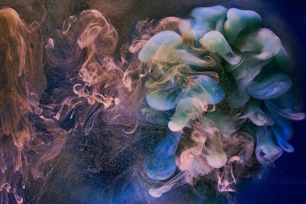 液体流体アート抽象的な背景水中で踊るアクリル絵の具のミックス