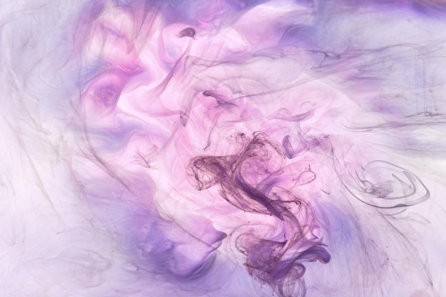 Liquid fluid art abstract background mix of purple lilac dancing acrylic paints underwater space smoke ocean