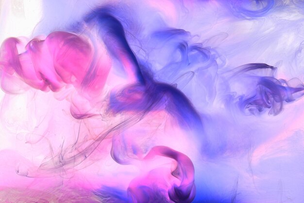 Liquid fluid art abstract background Pink blue acrylic paint underwater galactic smoke ocean