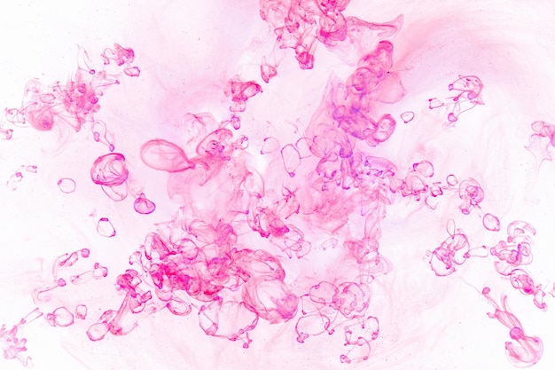 Liquido fluido arte astratto sfondo rosa danza acrilica dipinge fumo sott'acqua spazio oceanico