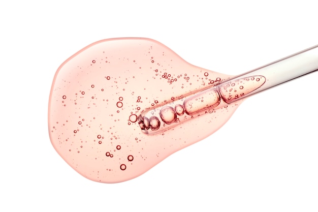 Gel o siero liquido su uno schermo di microscopio bianco isolato sfondo