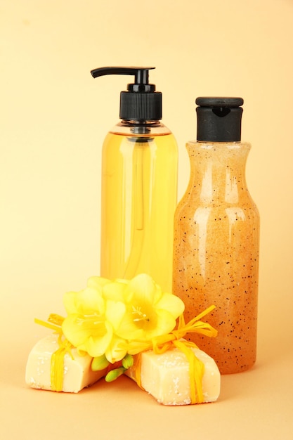 Photo liquid and handmade soaps on beige background