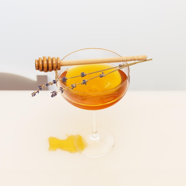 Жидкий мед в стеклянных веточках лаванды и ковш для меда на белом столе. Еда, повышающая иммунитет.