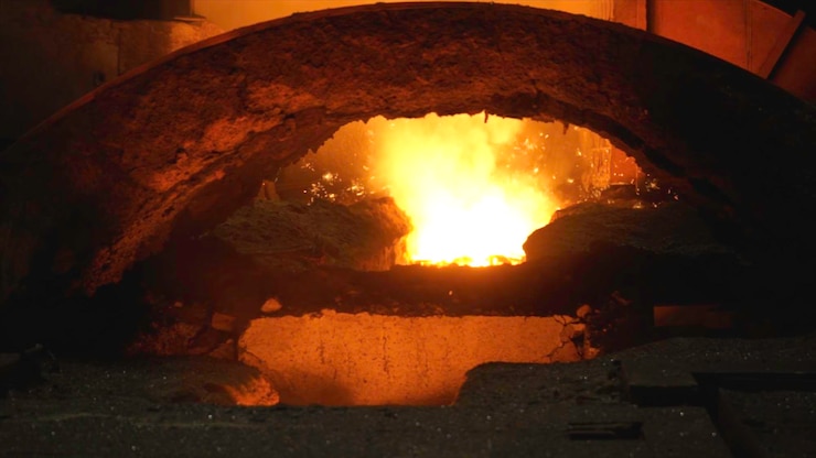 Photo liquid metal from blast furnace liquid iron from ladle in the steelworks
