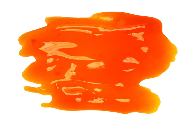 Liquid orange jelly isolated on white