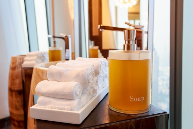 Liquid soap bottle on the bathtub in modern bathroom at home, hotel