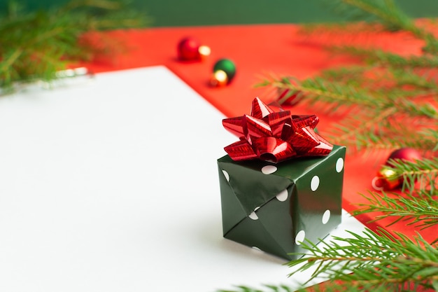 A list of christmas wishes next to several small gifts