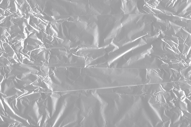 list of crumpled silver foil paper background