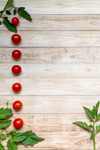 List menu cherry tomatoes on wooden table background dark light leaves