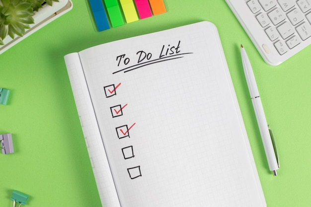 To do list in notebook plan Top view flat lay copy space