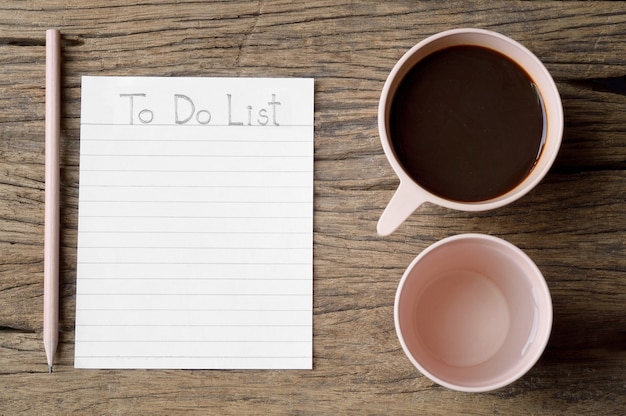 to do list word on wooden table with coffee cup