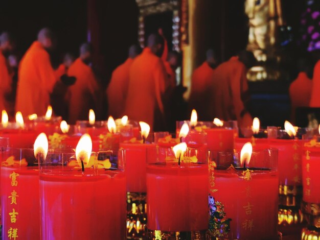 Lit candles in temple