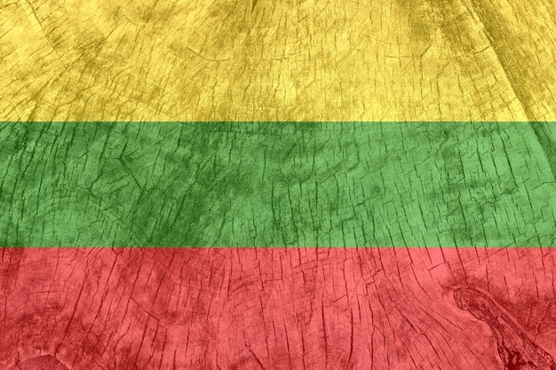 Lithuania flag on an old wooden surface