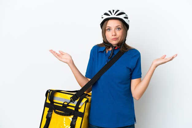 Lithuanian woman with thermal backpack having doubts while raising hands