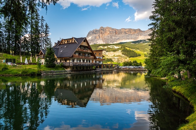 Little alpine lake dla le, near La Villa in the Dolomites of Val Badia, facing Sas dla Crusc