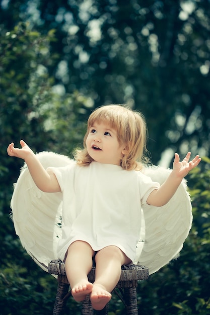 Little angel claps his hands