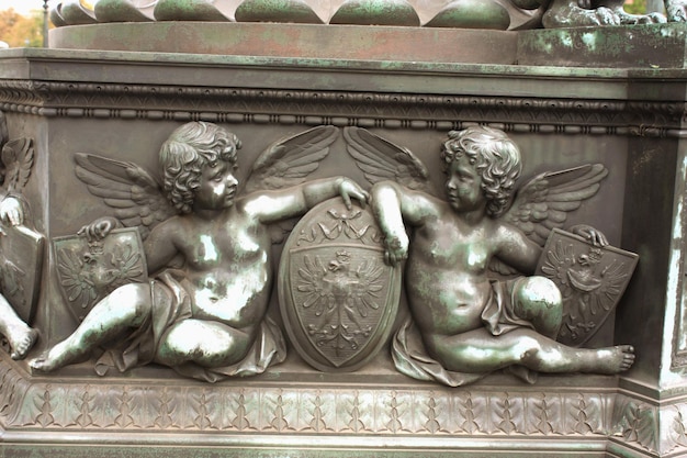 Photo little angels with the austrian coat of arms vienna parliament