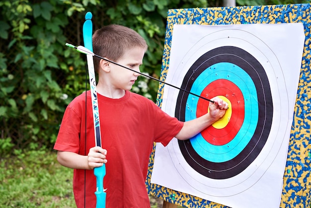 Little archer with bow and arrow