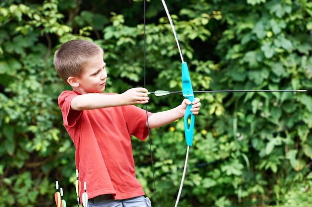 Little archer with bow and arrows