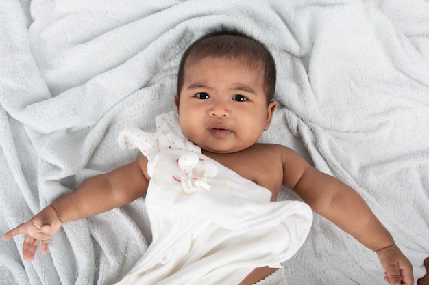 Little baby boy lying on soft towel