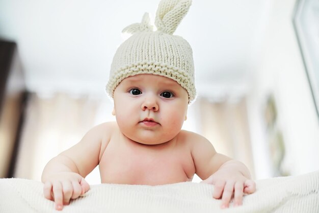 The little baby is lying on the crib Newborn baby