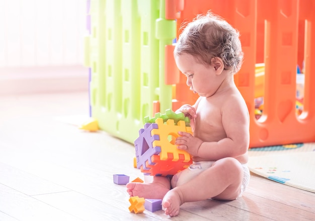 Little baby play with sorter toy