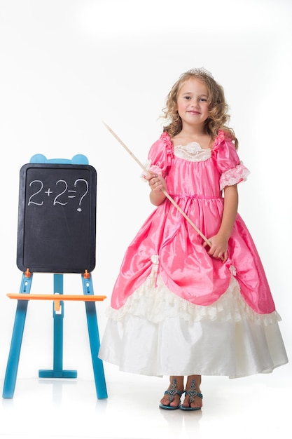 Little Beauty Queen Young girl as magic fairy on white background