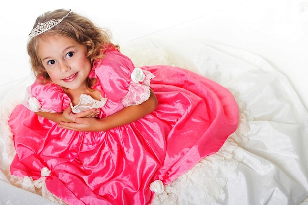 Photo little beauty queen young girl as magic fairy on white background