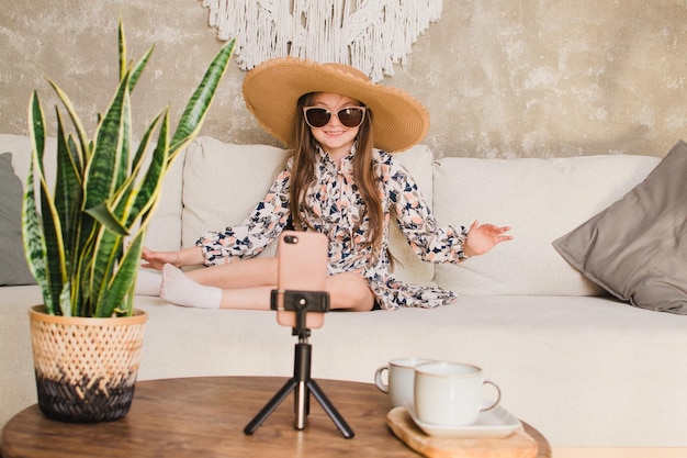 Little blogger girl on the couch