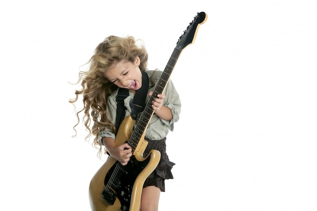 Little blond girl playing electric guitar hardcore wind hair