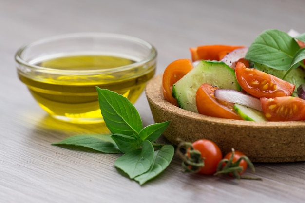 A little bowl of salad and olive oil