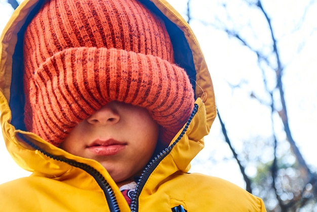 Little boy alone in the forest