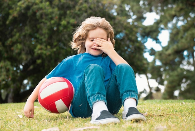 Little boy alone lonely with ball loneliness kids