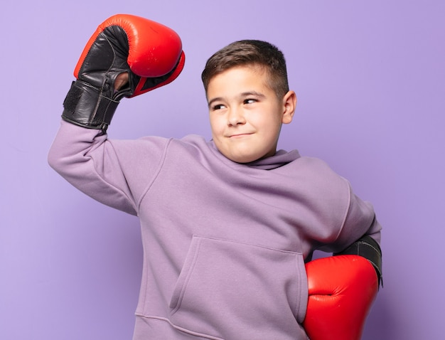 Little boy celebrating successful a victory boxing concept