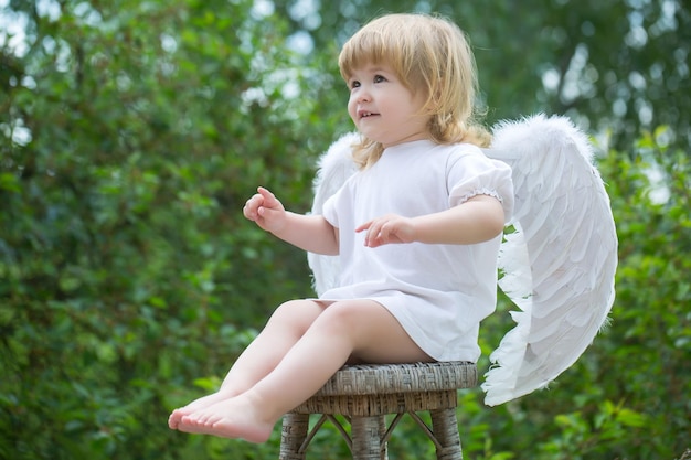 Little boy dressed as angel