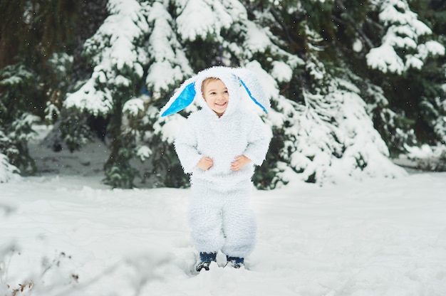 A little boy dressed as rabbit meets new year