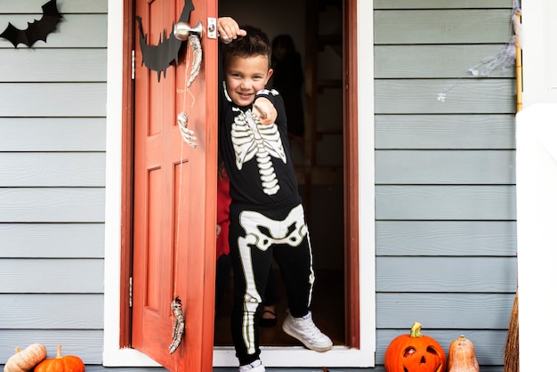 Little boy dressed up as a skelleton