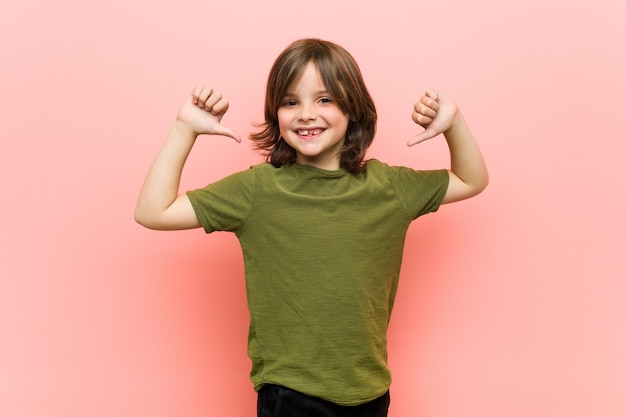 Little boy feels proud and self confident, example to follow.