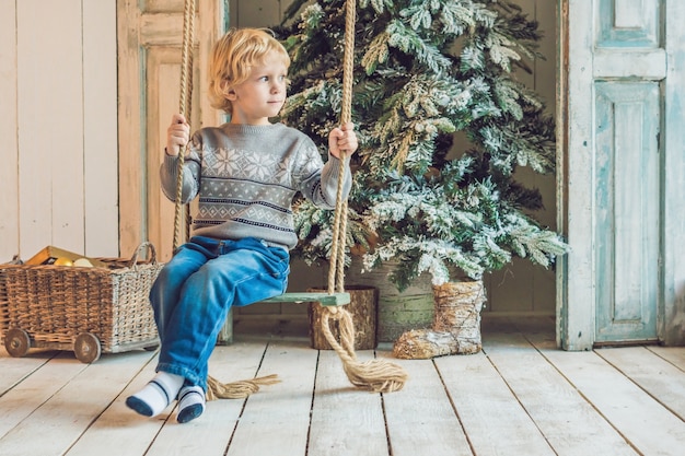 Little boy getting ready to holiday. Happy New Year and Merry Christmas