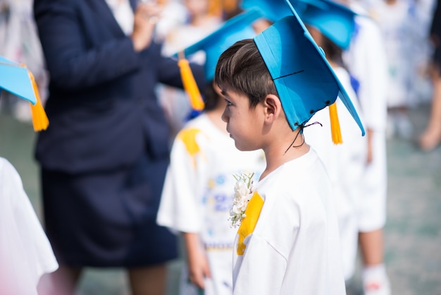 Little boy graduated at kindergarten school