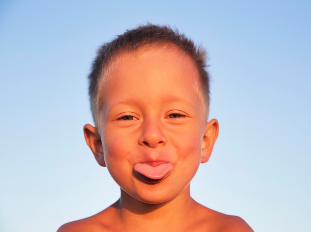 Little boy have fun on the beach