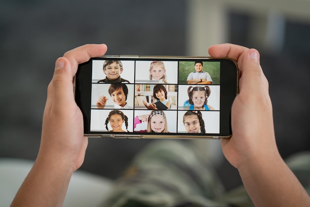 Little boy having online school distance learning class at home