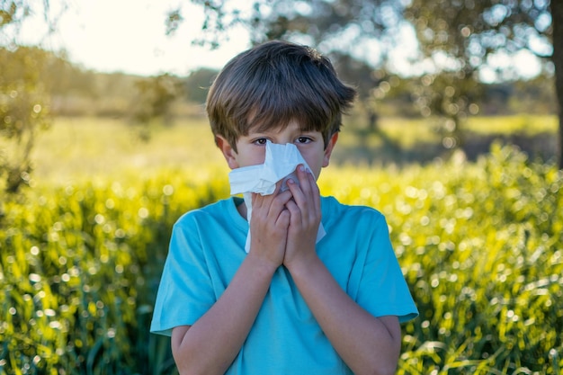 Little Boy Is Blowing Her Nose Allergy Concept