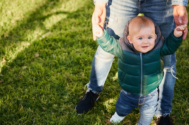 Little boy learning to walk